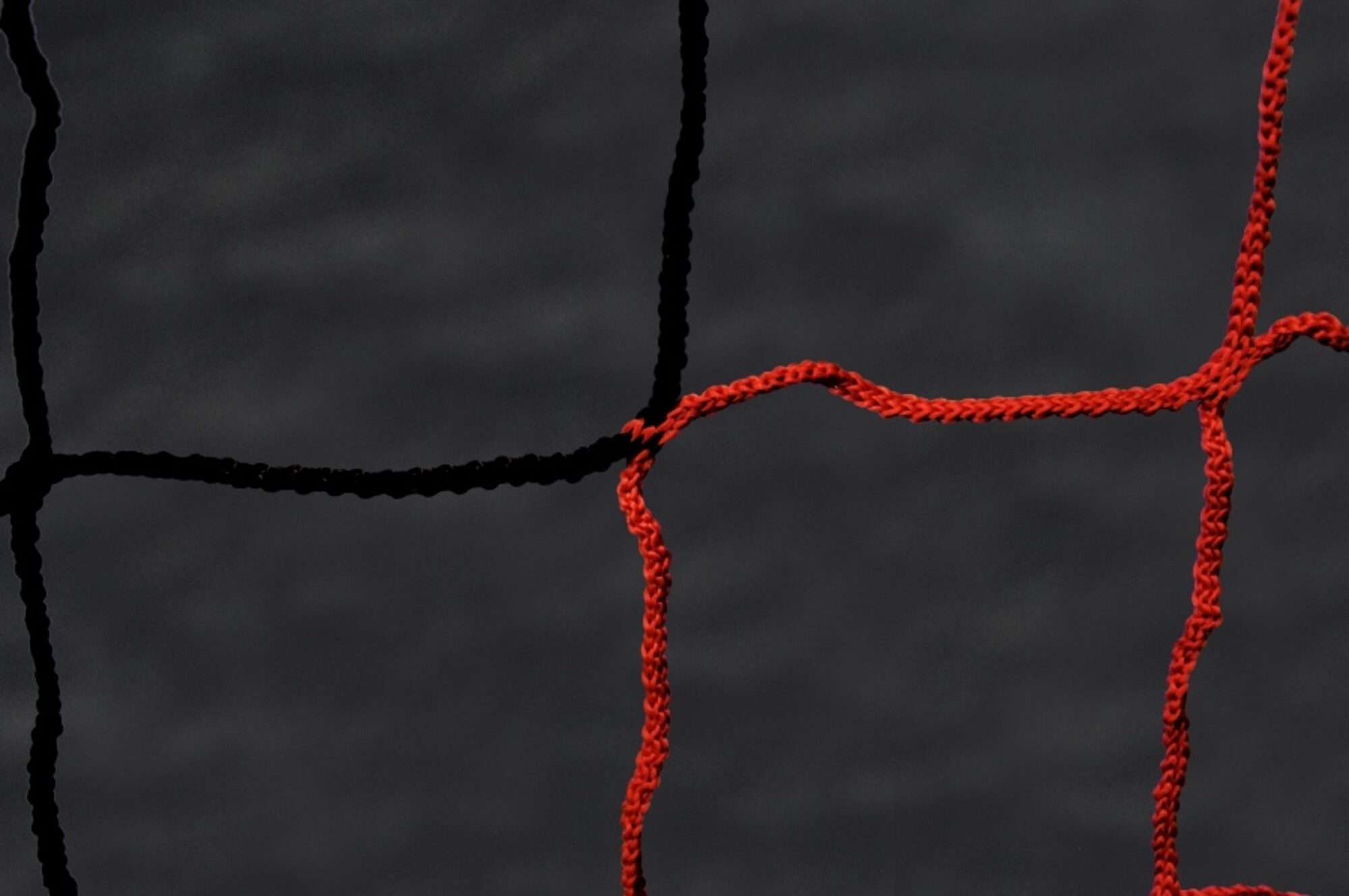 Image du produit : 2-kleurig voetbalnet 3mm (7,32x2,44m) Zwart / rood
