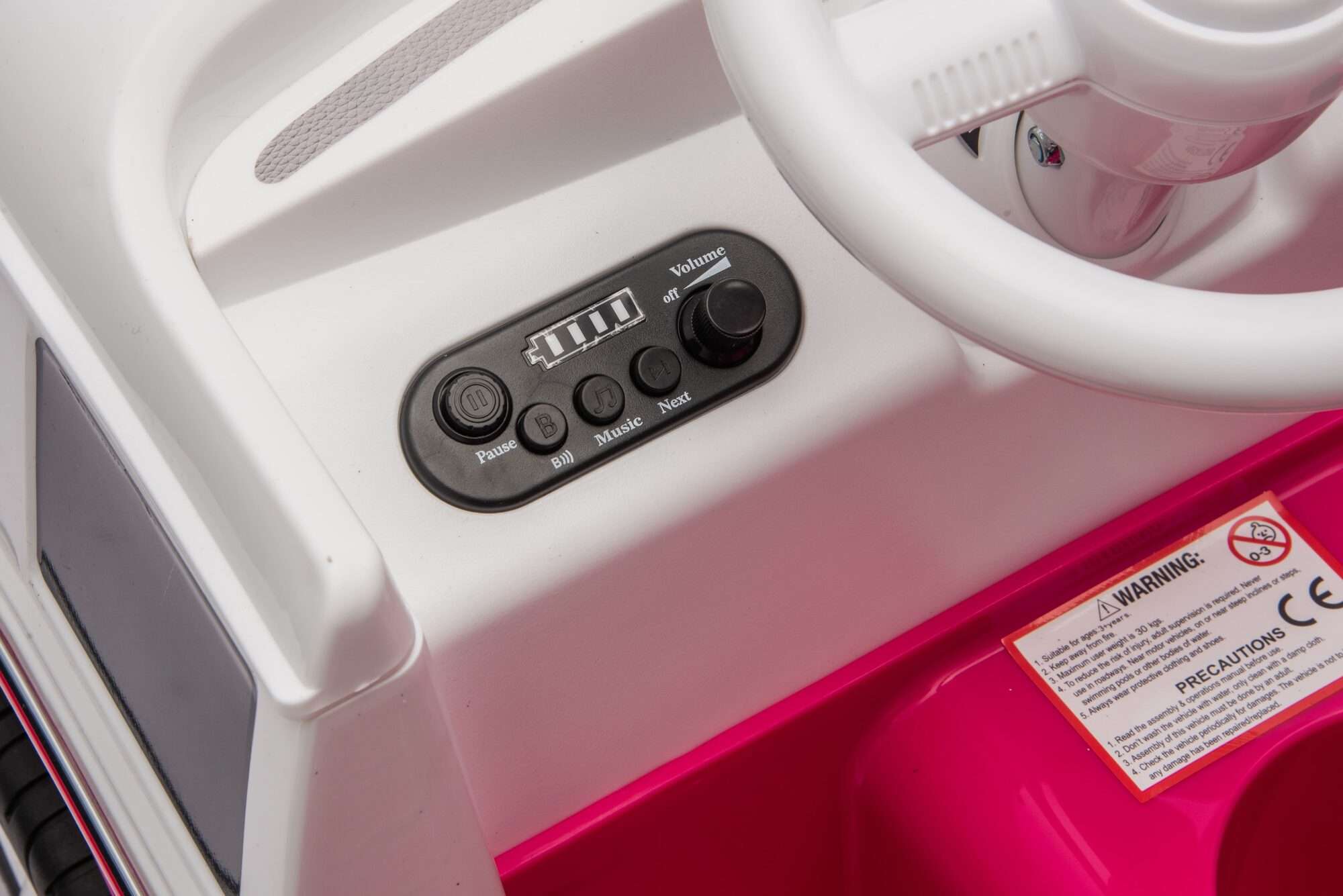 Image du produit : Volkswagen Officiële Elektrische Kinderauto - Roze & Wit (3 tot 8 jaar)